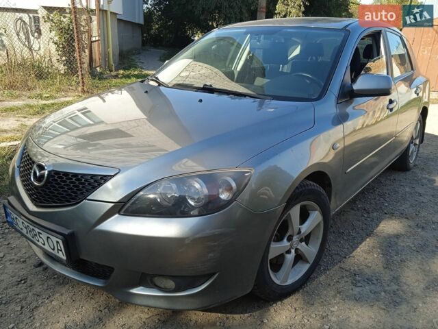 Серый Мазда 3, объемом двигателя 1.6 л и пробегом 208 тыс. км за 2450 $, фото 1 на Automoto.ua