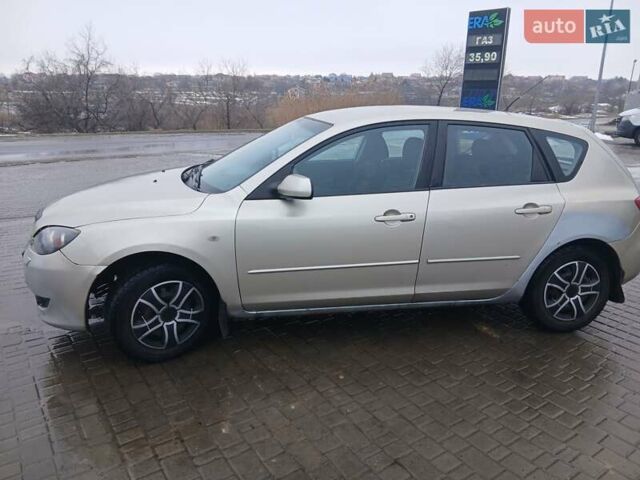 Серый Мазда 3, объемом двигателя 1.6 л и пробегом 338 тыс. км за 2900 $, фото 1 на Automoto.ua