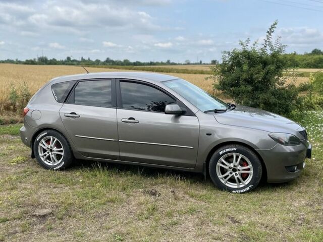 Сірий Мазда 3, об'ємом двигуна 1.6 л та пробігом 260 тис. км за 3800 $, фото 1 на Automoto.ua