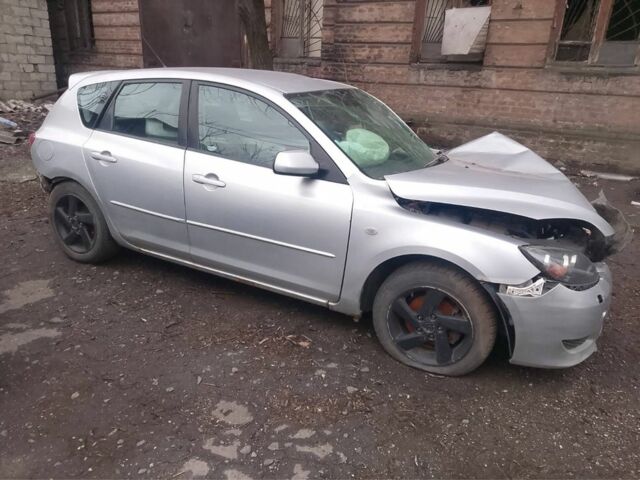 Серый Мазда 3, объемом двигателя 1.6 л и пробегом 333 тыс. км за 1500 $, фото 1 на Automoto.ua