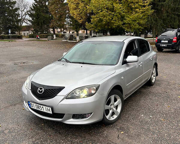 Серый Мазда 3, объемом двигателя 1.6 л и пробегом 282 тыс. км за 4100 $, фото 1 на Automoto.ua