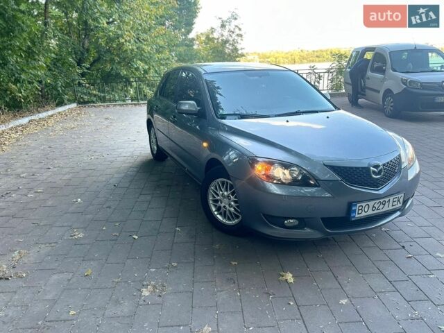 Серый Мазда 3, объемом двигателя 1.6 л и пробегом 320 тыс. км за 3300 $, фото 1 на Automoto.ua