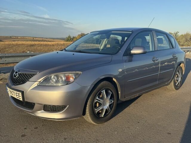 Серый Мазда 3, объемом двигателя 1.6 л и пробегом 300 тыс. км за 3309 $, фото 1 на Automoto.ua