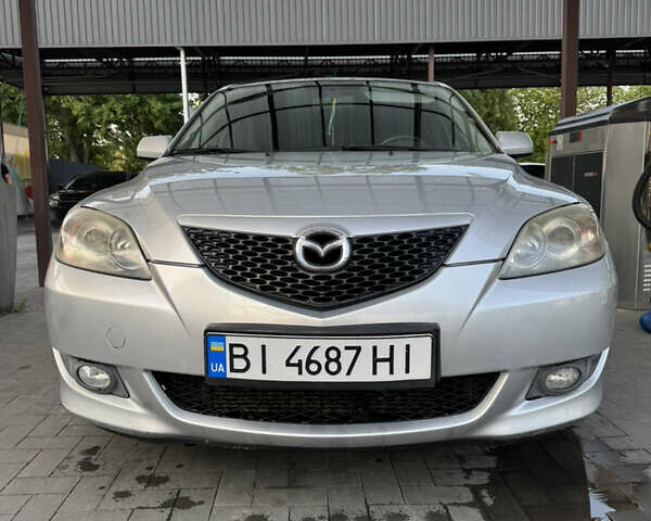 Серый Мазда 3, объемом двигателя 1.56 л и пробегом 170 тыс. км за 4800 $, фото 1 на Automoto.ua
