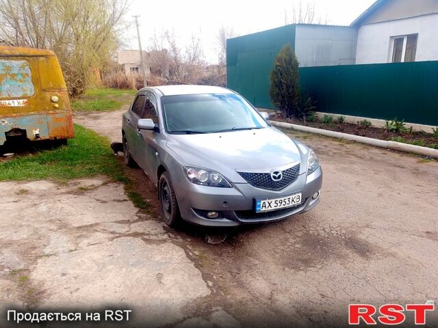 Серый Мазда 3, объемом двигателя 2 л и пробегом 297 тыс. км за 2800 $, фото 1 на Automoto.ua