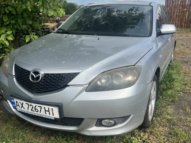 Сірий Мазда 3, об'ємом двигуна 2 л та пробігом 250 тис. км за 1000 $, фото 1 на Automoto.ua