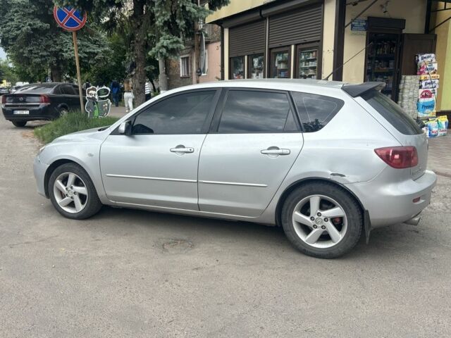 Сірий Мазда 3, об'ємом двигуна 1.3 л та пробігом 247 тис. км за 3500 $, фото 1 на Automoto.ua
