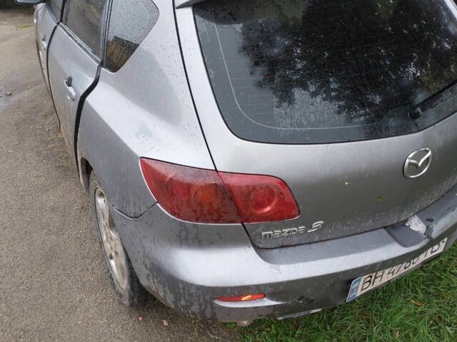 Серый Мазда 3, объемом двигателя 0 л и пробегом 330 тыс. км за 1000 $, фото 1 на Automoto.ua