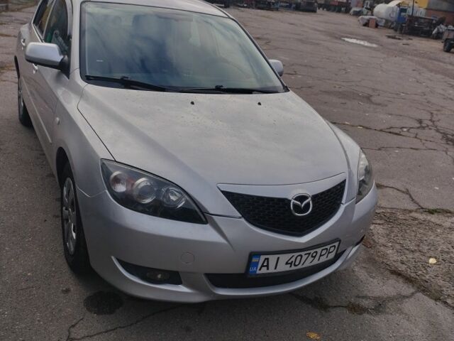 Серый Мазда 3, объемом двигателя 1.6 л и пробегом 330 тыс. км за 4000 $, фото 1 на Automoto.ua