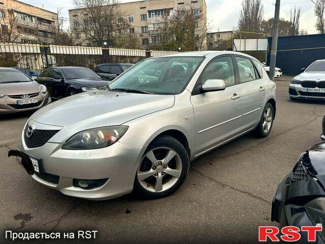 Серый Мазда 3, объемом двигателя 1.6 л и пробегом 125 тыс. км за 4200 $, фото 1 на Automoto.ua