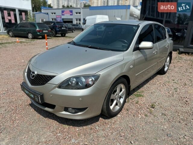 Серый Мазда 3, объемом двигателя 1.6 л и пробегом 172 тыс. км за 3899 $, фото 1 на Automoto.ua