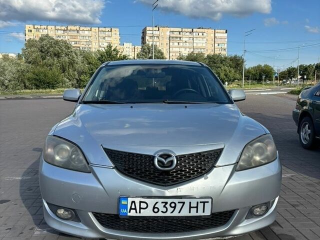 Серый Мазда 3, объемом двигателя 1.6 л и пробегом 285 тыс. км за 3000 $, фото 1 на Automoto.ua