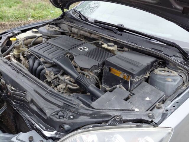 Сірий Мазда 3, об'ємом двигуна 1.6 л та пробігом 244 тис. км за 4500 $, фото 1 на Automoto.ua