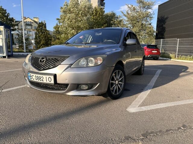 Серый Мазда 3, объемом двигателя 2 л и пробегом 240 тыс. км за 3518 $, фото 1 на Automoto.ua