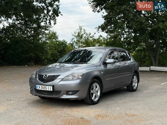 Серый Мазда 3, объемом двигателя 1.6 л и пробегом 255 тыс. км за 3550 $, фото 1 на Automoto.ua