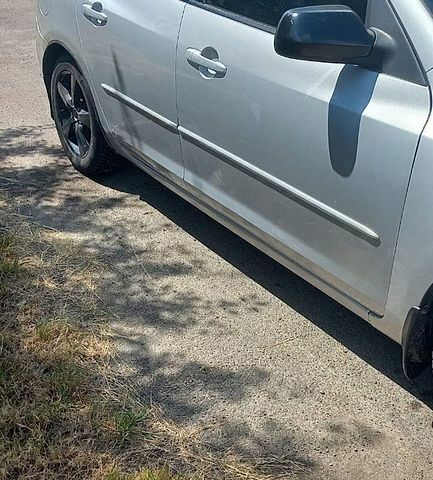 Сірий Мазда 3, об'ємом двигуна 1.56 л та пробігом 236 тис. км за 2980 $, фото 1 на Automoto.ua