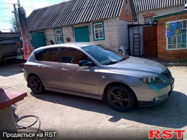 Серый Мазда 3, объемом двигателя 1.6 л и пробегом 243 тыс. км за 3500 $, фото 1 на Automoto.ua