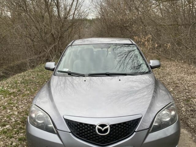 Серый Мазда 3, объемом двигателя 1.6 л и пробегом 297 тыс. км за 1986 $, фото 1 на Automoto.ua