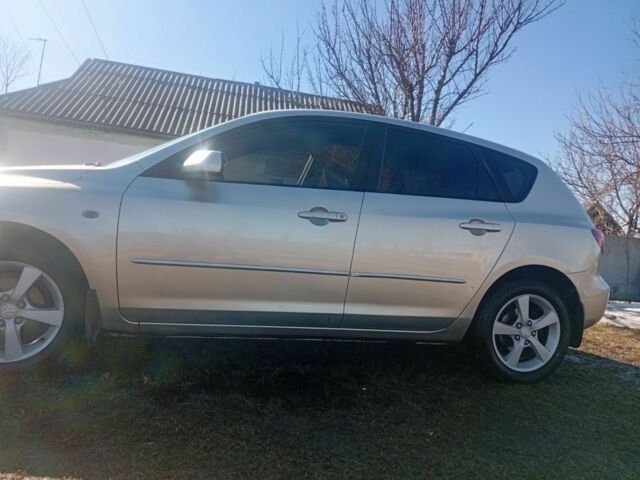 Сірий Мазда 3, об'ємом двигуна 1.8 л та пробігом 264 тис. км за 4500 $, фото 1 на Automoto.ua