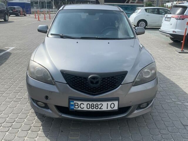 Серый Мазда 3, объемом двигателя 2 л и пробегом 235 тыс. км за 3400 $, фото 1 на Automoto.ua