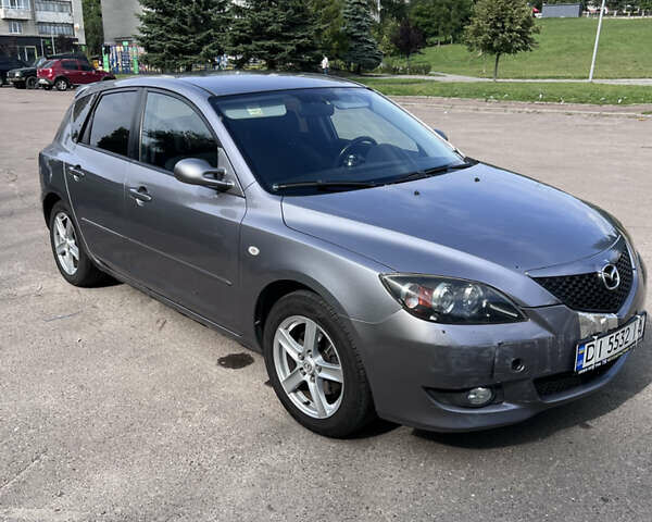 Сірий Мазда 3, об'ємом двигуна 1.6 л та пробігом 244 тис. км за 3700 $, фото 1 на Automoto.ua