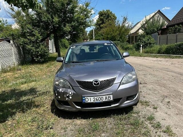 Серый Мазда 3, объемом двигателя 2 л и пробегом 312 тыс. км за 3000 $, фото 1 на Automoto.ua
