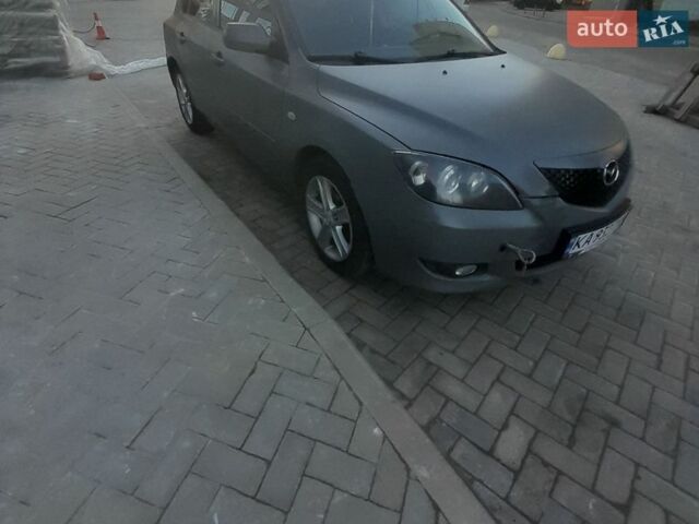 Серый Мазда 3, объемом двигателя 1.6 л и пробегом 288 тыс. км за 3000 $, фото 1 на Automoto.ua