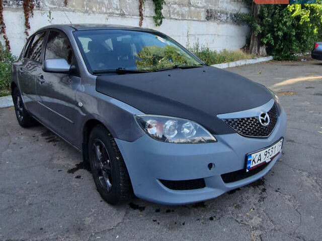 Серый Мазда 3, объемом двигателя 1.6 л и пробегом 285 тыс. км за 4600 $, фото 1 на Automoto.ua