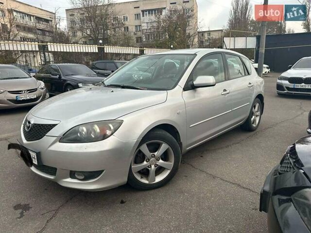 Серый Мазда 3, объемом двигателя 1.6 л и пробегом 125 тыс. км за 4200 $, фото 1 на Automoto.ua
