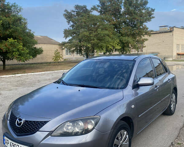 Серый Мазда 3, объемом двигателя 1.6 л и пробегом 260 тыс. км за 3900 $, фото 1 на Automoto.ua