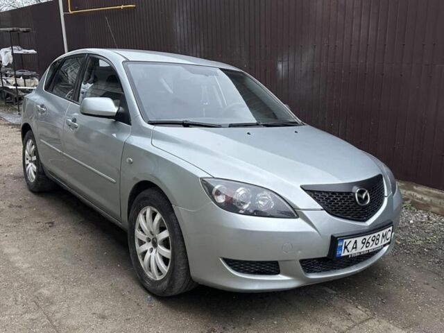 Серый Мазда 3, объемом двигателя 1.6 л и пробегом 206 тыс. км за 3950 $, фото 1 на Automoto.ua