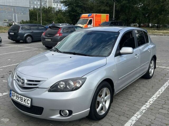 Серый Мазда 3, объемом двигателя 2 л и пробегом 190 тыс. км за 3900 $, фото 1 на Automoto.ua