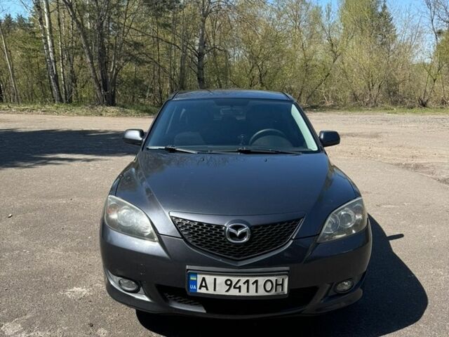 Сірий Мазда 3, об'ємом двигуна 1.56 л та пробігом 342 тис. км за 4200 $, фото 1 на Automoto.ua