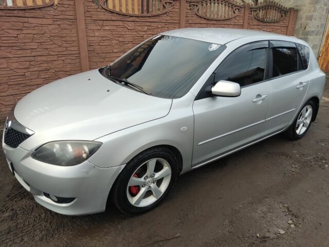 Серый Мазда 3, объемом двигателя 1.6 л и пробегом 373 тыс. км за 3500 $, фото 1 на Automoto.ua