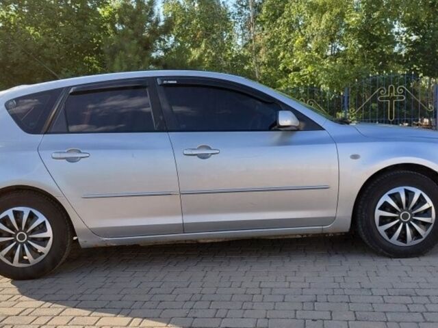 Серый Мазда 3, объемом двигателя 1.6 л и пробегом 350 тыс. км за 2226 $, фото 1 на Automoto.ua