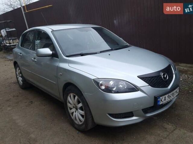Серый Мазда 3, объемом двигателя 1.6 л и пробегом 206 тыс. км за 3950 $, фото 1 на Automoto.ua