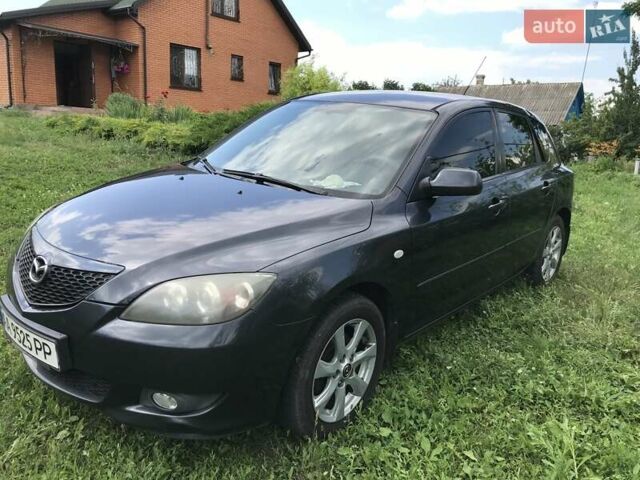 Серый Мазда 3, объемом двигателя 1.6 л и пробегом 190 тыс. км за 6000 $, фото 1 на Automoto.ua