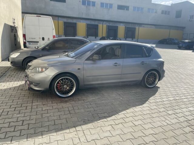 Серый Мазда 3, объемом двигателя 2 л и пробегом 198 тыс. км за 5500 $, фото 1 на Automoto.ua