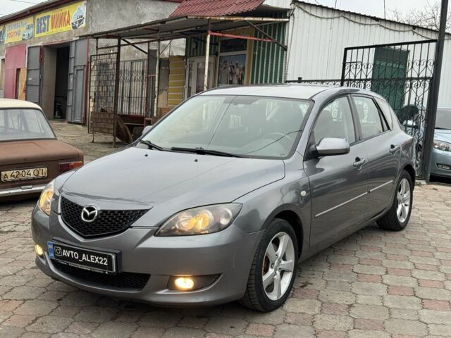Серый Мазда 3, объемом двигателя 1.6 л и пробегом 243 тыс. км за 3950 $, фото 1 на Automoto.ua