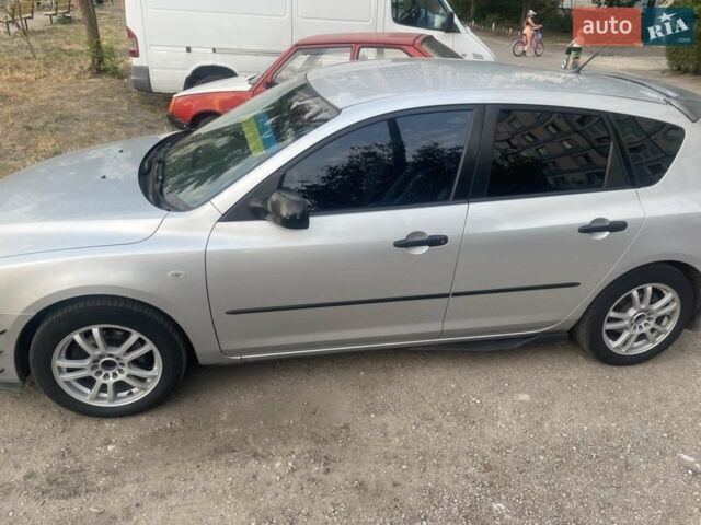 Серый Мазда 3, объемом двигателя 1.4 л и пробегом 221 тыс. км за 4799 $, фото 1 на Automoto.ua