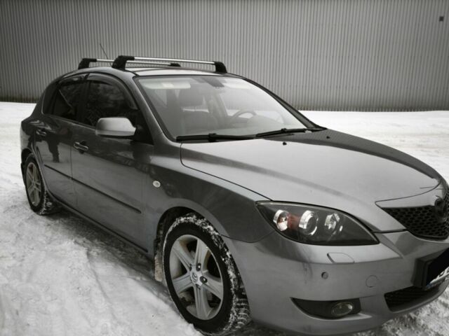 Серый Мазда 3, объемом двигателя 2 л и пробегом 292 тыс. км за 4999 $, фото 1 на Automoto.ua