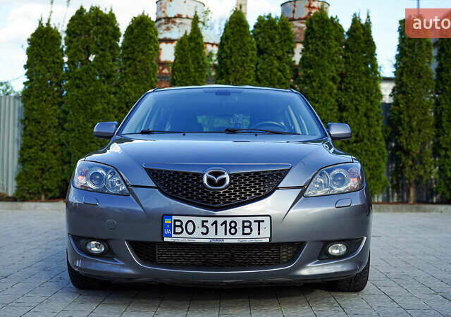 Серый Мазда 3, объемом двигателя 1.6 л и пробегом 240 тыс. км за 3950 $, фото 1 на Automoto.ua
