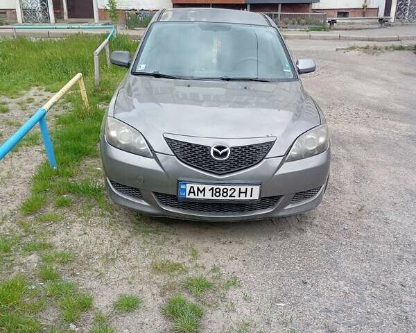 Серый Мазда 3, объемом двигателя 1.3 л и пробегом 228 тыс. км за 2800 $, фото 1 на Automoto.ua