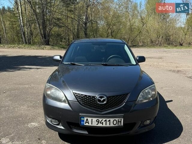Серый Мазда 3, объемом двигателя 1.56 л и пробегом 342 тыс. км за 4300 $, фото 1 на Automoto.ua