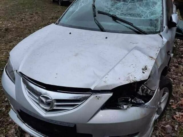 Серый Мазда 3, объемом двигателя 1.6 л и пробегом 380 тыс. км за 2000 $, фото 1 на Automoto.ua