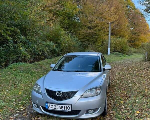 Серый Мазда 3, объемом двигателя 1.6 л и пробегом 248 тыс. км за 4800 $, фото 1 на Automoto.ua