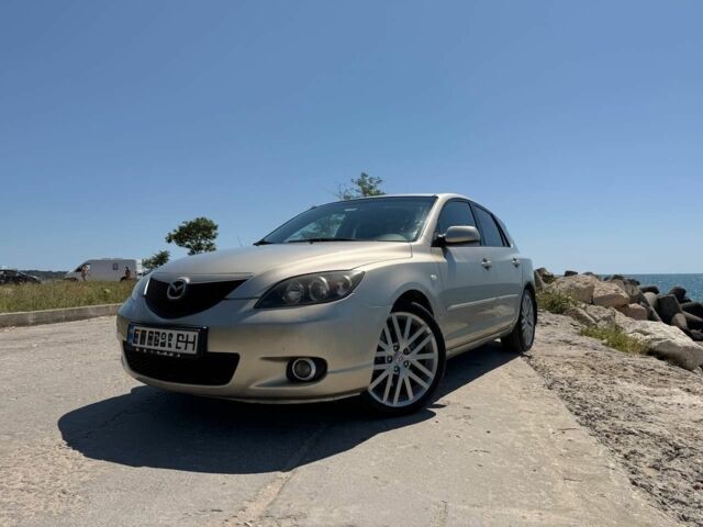 Серый Мазда 3, объемом двигателя 1.6 л и пробегом 250 тыс. км за 3998 $, фото 1 на Automoto.ua