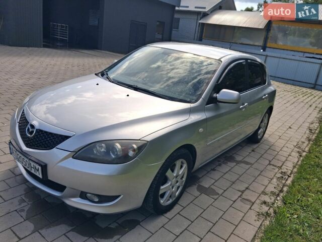 Сірий Мазда 3, об'ємом двигуна 2 л та пробігом 181 тис. км за 4150 $, фото 1 на Automoto.ua