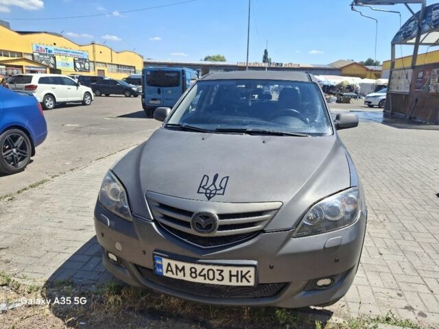 Серый Мазда 3, объемом двигателя 2 л и пробегом 295 тыс. км за 3750 $, фото 1 на Automoto.ua