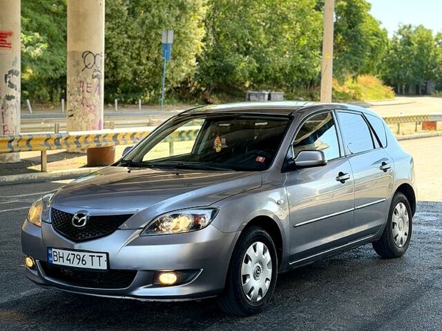 Серый Мазда 3, объемом двигателя 1.6 л и пробегом 255 тыс. км за 4350 $, фото 1 на Automoto.ua